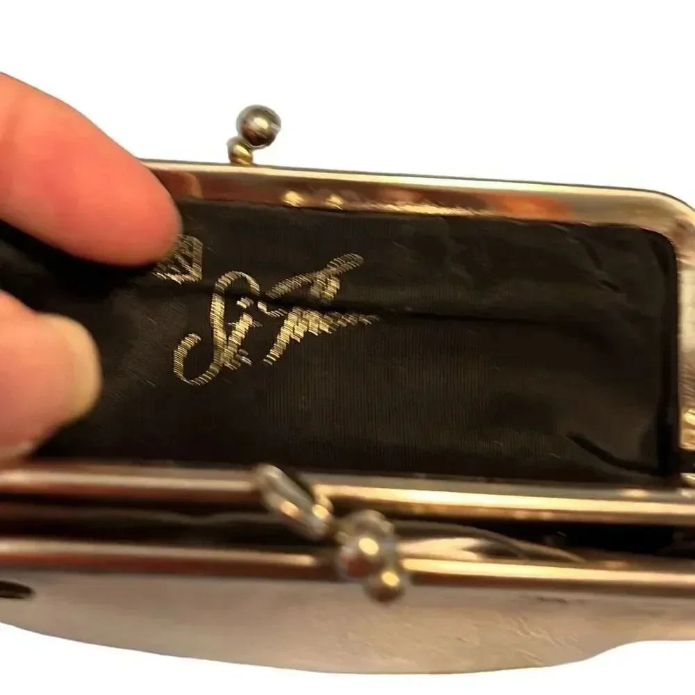 Saint Thomas metal clasp coin purse